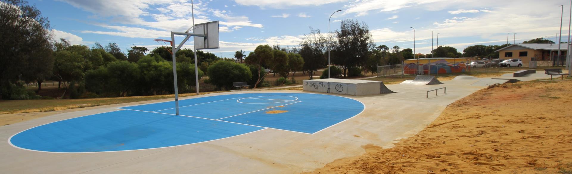 Basketball half court and skate/scoot track