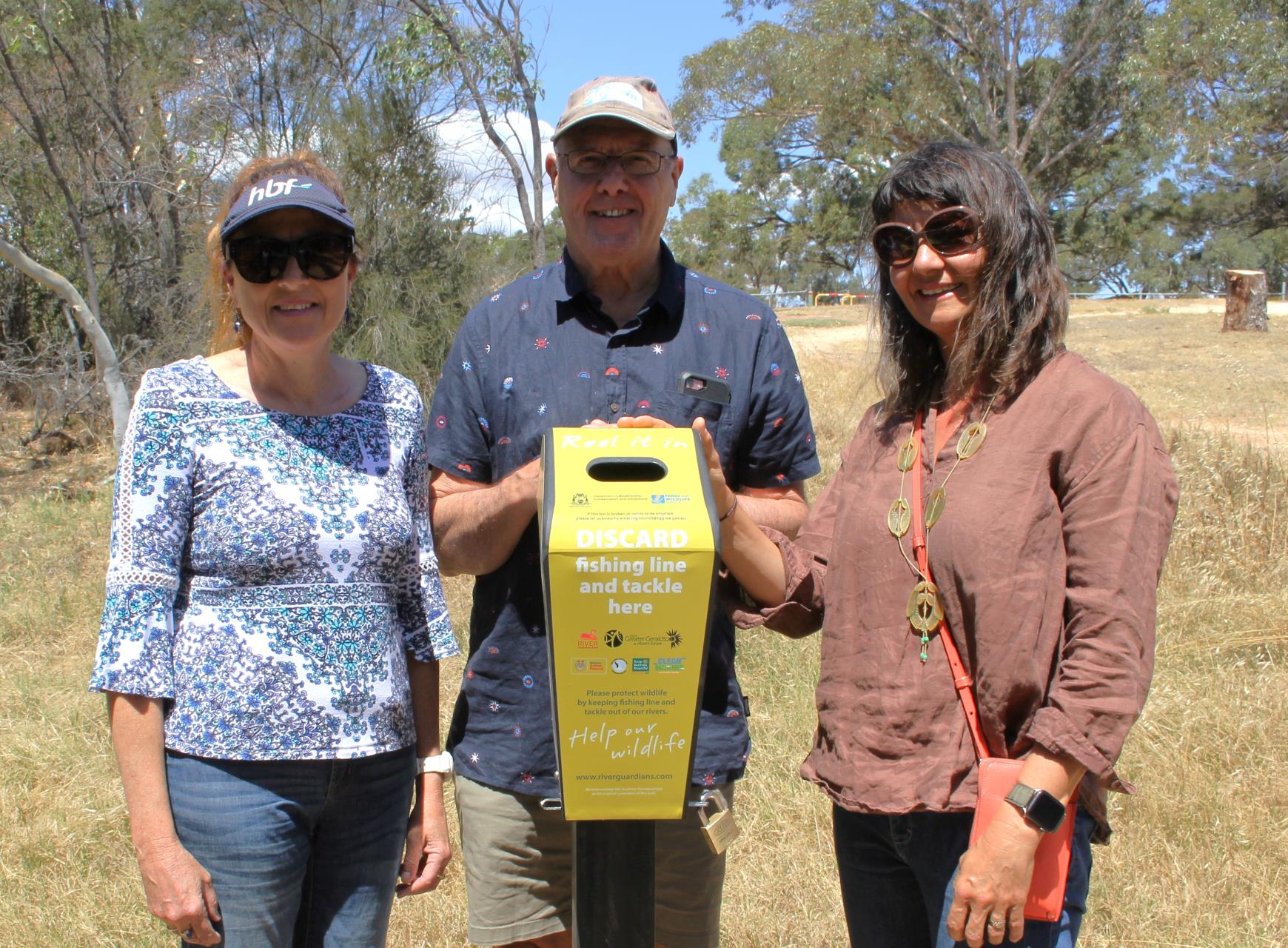 Chapman River Friends Laura Garraway (left), Stuart Estcourt and Virginie Fuhrmann will be assisting the City with emptying, maintaining and reporting bin contents.