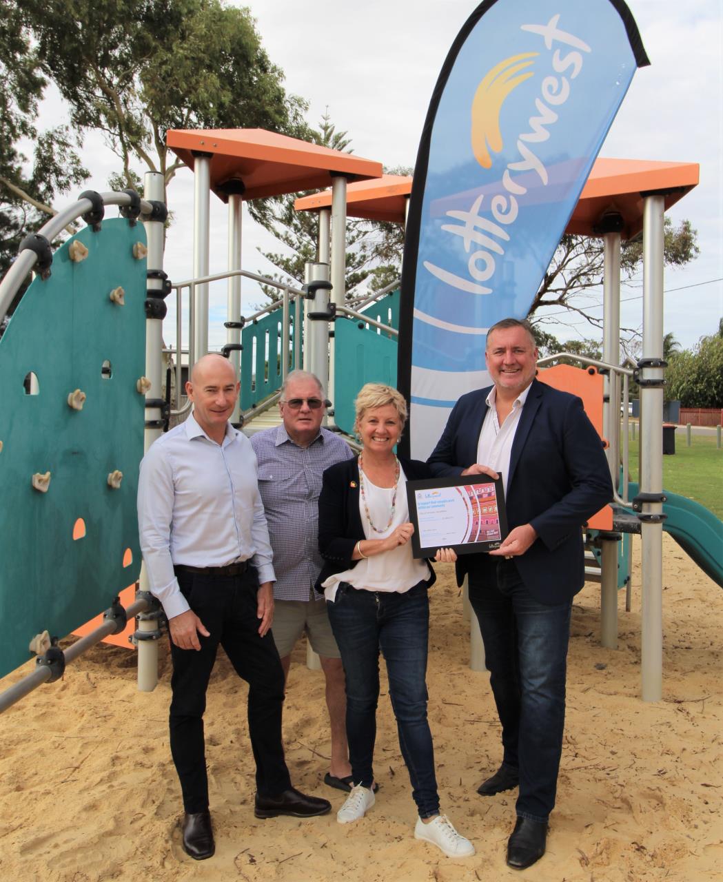 Lara Dalton MLA hands a Lotterywest cheque for $1,445,572 to Mayor Shane Van Styn to fund upgrades to the AMC Park in Spalding. Joining them are City of Greater Geraldton Director Infrastructure Services Chris Lee (left) and Councillor Bob Hall. 
