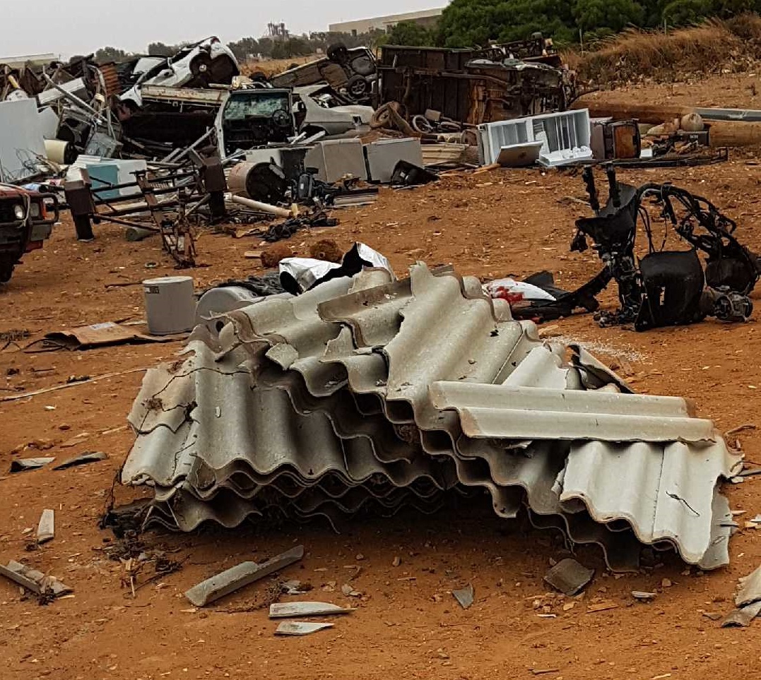 Asbestos sheets illegally dumped at Meru Waste Facility.