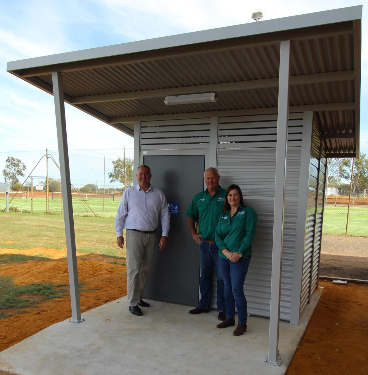 City of Greater Geraldton Mayor Shane Van Styn (left) and the Mullewa District Agricultural Society’s President Peter Barnetson and Secretary Julie Freeman in front of the new universal access toilet installed at the Mullewa Recreation Centre.