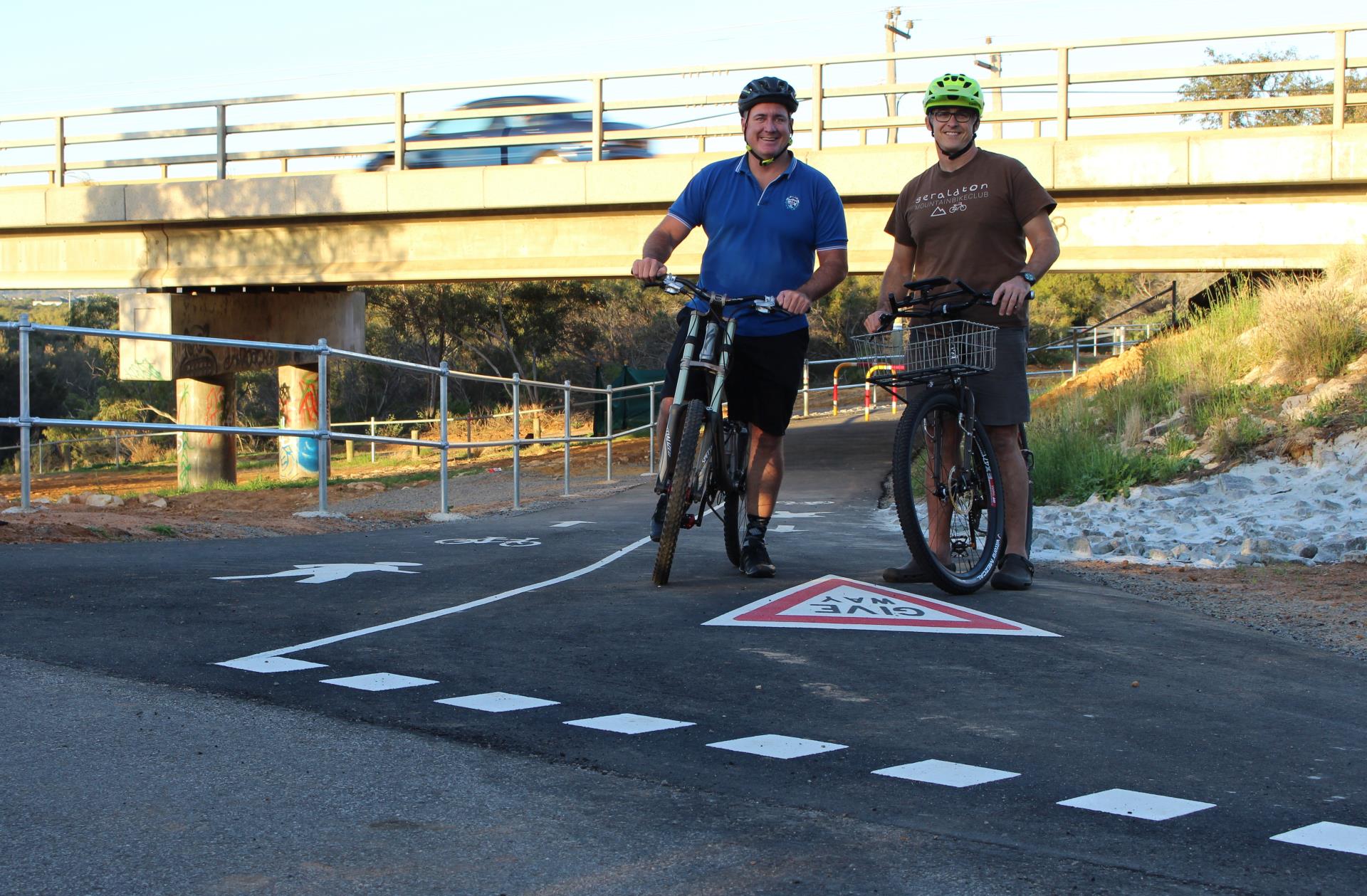 City of Greater Geraldton Mayor Shane Van Styn (left) and Geraldton Mountain Bike Club President Paul Spackman complete a test drive on the recently completed off road shared path located on the east side of the NWCH that links Green Street to Spalding Park via a fully accessible Chapman River bridge underpass.