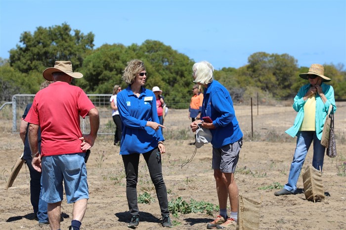 Image Gallery - Volunteers chat in the paddock