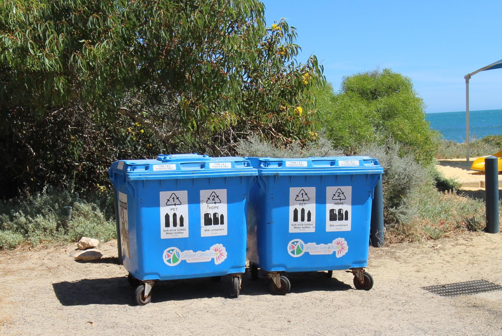 Blue recycling bins on the move
